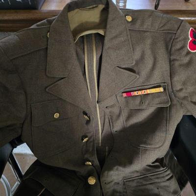 WWll military uniform with pictures  being worn