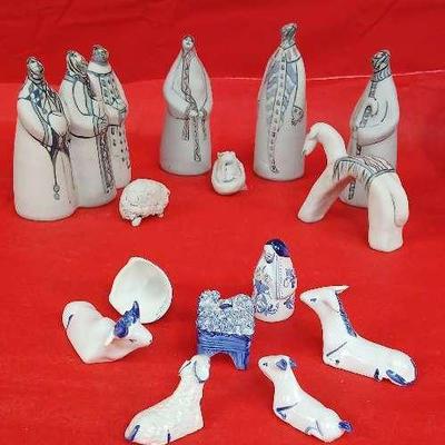 Two Hand Sculpted and Painted Nativity Scenes 