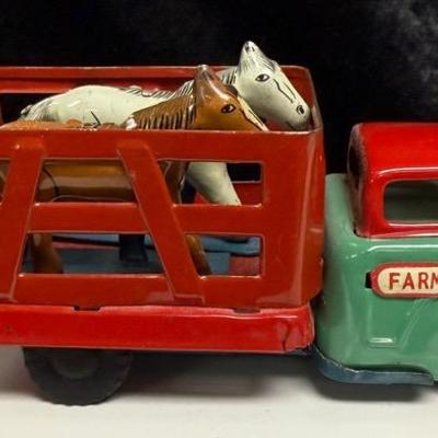 Red Stake Truck Bed Carrying 2 Toy Horses 