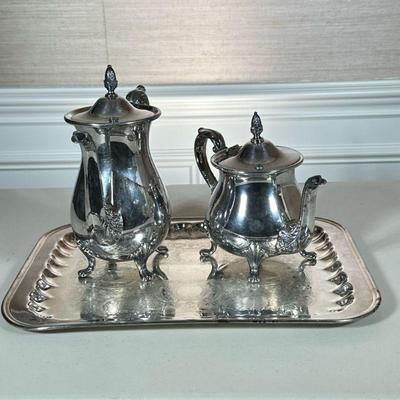 SILVER PLATE COFFEE & TEA SET | Silver plate coffee pot, tea pot, and tray; tray 16.5 x 11.5 in - h. 10.5 x w. 5 x l. 9 in. (coffee...