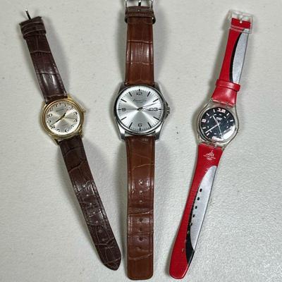 (3pc) WRISTWATCHES | Including; Torino 2006 Swatch, Kenneth Cole New York, and Bulova Watch - h. 10 x dia. 2 in. (largest)

