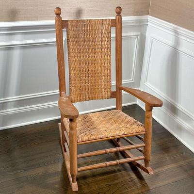 CARVED WOOD ROCKER | With rush seat & back - h. 43 x w. 27.5 x d. 34 in.
