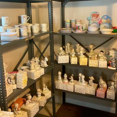 Precious Moments figures with boxes