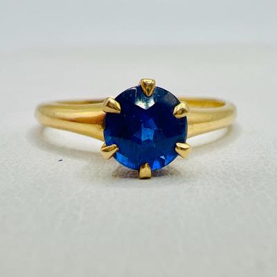 14K Gold Ring with Sparkling Blue Solitaire 