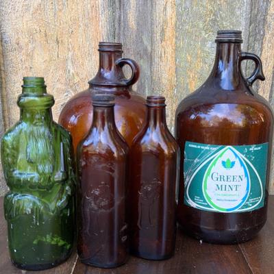 Vintage Cod Liver Oil Bottle/Gree Figural Man Bottle/Brown Glass 