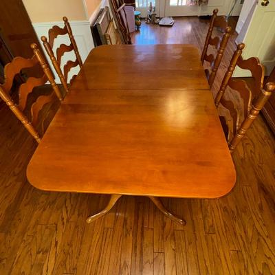 Four Ladder Backs And Table 