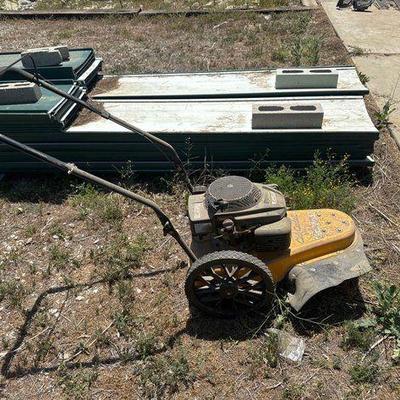 #5022 • Cub Cadet ST 100 22” Wheeled String Trimmer

