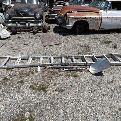 #666 • Little Giant Folding extension ladder, shovel, and pitchfork
