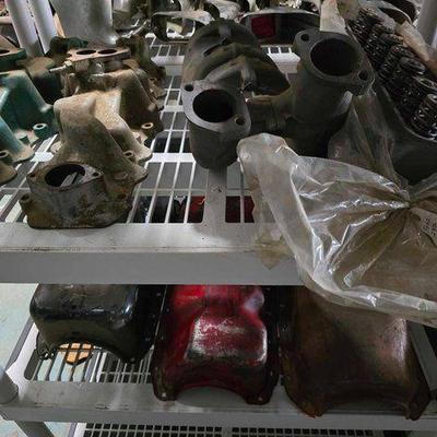 #2504 • 2 Intake Manifolds, Exhaust Manifold, Ford 292 Head, and 3 Oil Pans
