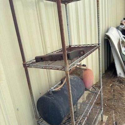 #4502 • Metal Rack with Tow Hitch, 2 Air Tanks, 1 Motor Head
