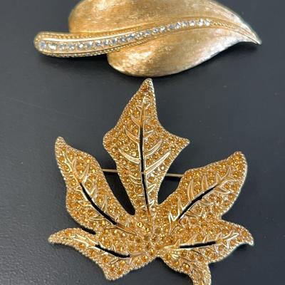 Two Christian Dior Gold-Tone Leaf Brooches