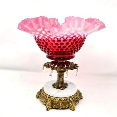 Vintage Fenton Hobnail Fluffed Glass Bowl in Cranberry Sits on Top of a Gold-tone and Marble Pedestal.