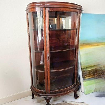 Antique Bow Front Display Case w/ Ball and Claw Legs and Original Casters - Back Mirror is Naturally Antiqued
