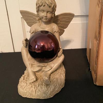 Angel with gazing ball