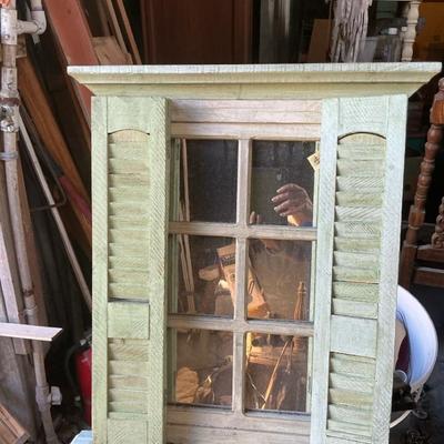 Shuttered Window Mirror Display
