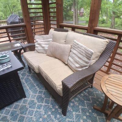 PLASTIC COATED WICKER SETTEE