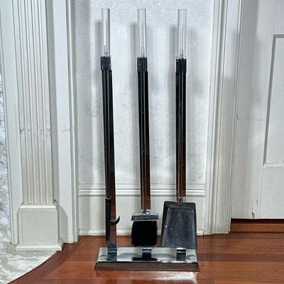 (4pc) ALESSANDRO ALBRIZZI LUCITE FIREPLACE TOOLS | Design by Alessandro Albrizzi Circa 1970. Materials: Chrome and lucite. - h. 32 x w....