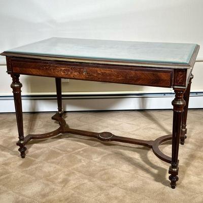MARQUETRY FRENCH TABLE | Having inlay marquetry top with floral decoration, floral decorated marquetry front drawer over spindle carved...