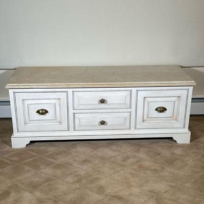 SUPERIOR WOODCRAFT STONE TOP LOW TABLE | Having beveled stone top over split-width drawers with brass pulls - h. 21 x w. 56 x d. 20 in
