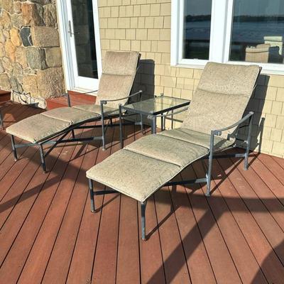 (3pc) PATIO LOUNGE SET | Including pair of wrought iron & wicker seat loungers with cushions, and glass top table - h. 41 x w. 29 x...