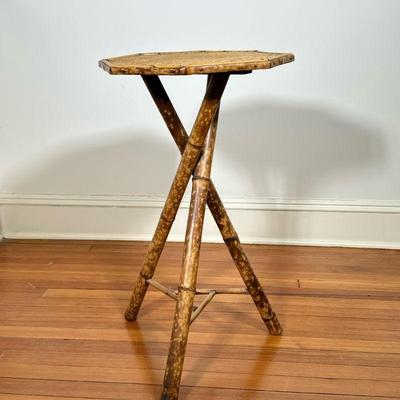 VICTORIAN BAMBOO SIDE TABLE | Bamboo tripod side table with woven octagonal table top. Dimensions: h. 28 x w. 16 x d. 16 in.
