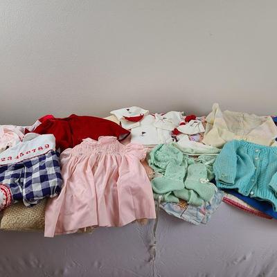 Vintage children's clothes and blankets