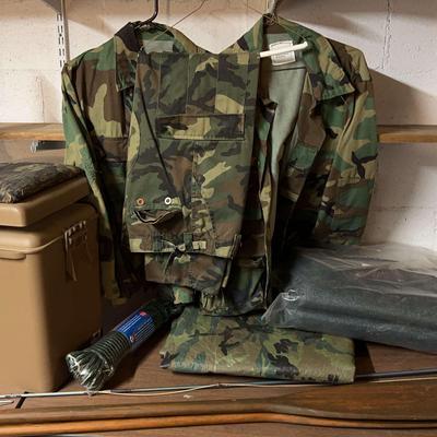 Army Style Clothing, Tarps, Fishing Rod And A Boat Seat
