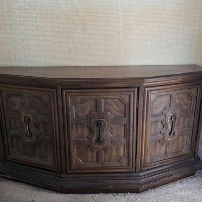 Classic Three-Door Wooden Cabinet w/ Unique Metal Pulls & Carved Doors	