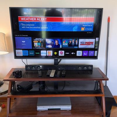 LG 50” Tv W/ Surround Sound System +