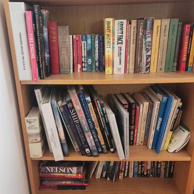 Bookshelf With Hard And Soft Cover Books