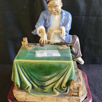 PORCELAIN CHINESE GAMBLER STATUE