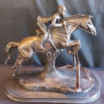 BRONZE JOCKEY RIDING A HORSE JUMPING OF A HURDLE SCULPTURE 