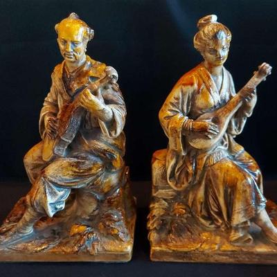 JAPANESE CERAMIC GEISHA AND MAN PLAYING SHAMISEN SCULPTURES