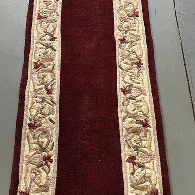 Handcrafted Ruby Colored, Handcrafted Wool Runner with elegant patterns.