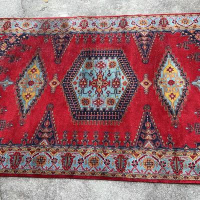 Area Rug In Burgundy And Blue Tones