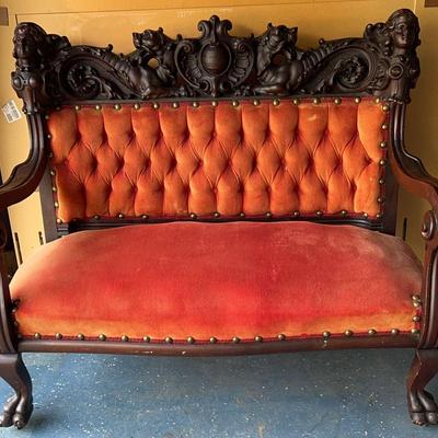 Victorian-Style Carved Settee with Claw Feet and Velvet Upholstery