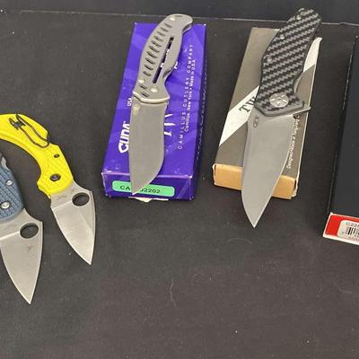 Assorted Knives Featuring Spyderco, Two Sun, & Cud’s