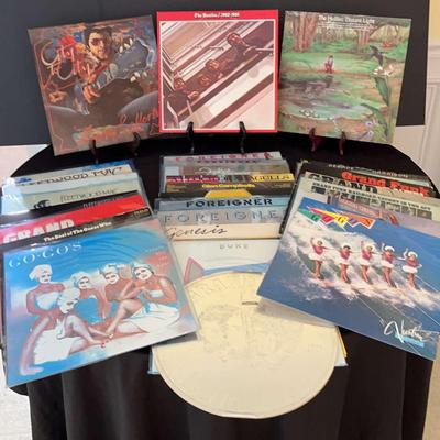 Vinyl Collection Featuring The Beatles, Go-Go's, Genesis & Foreigner