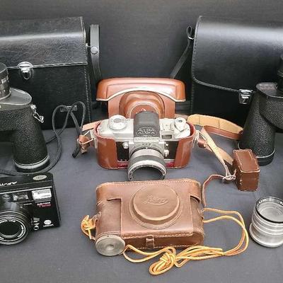Binoculars With 35mm Cameras Featuring Leica