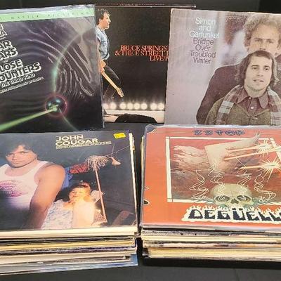 Vinyl Records Featuring ZZ Top, The Beatles, And More