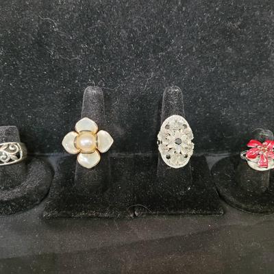 Four Sterling Floral Rings