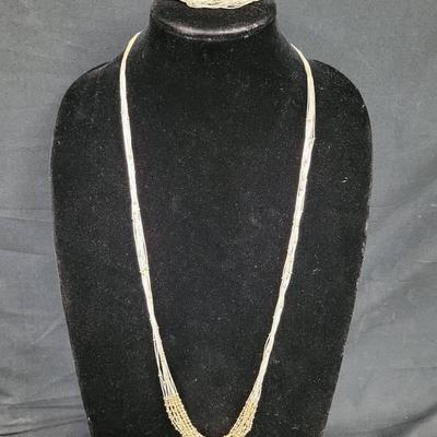 Liquid Silver with Gold Beads