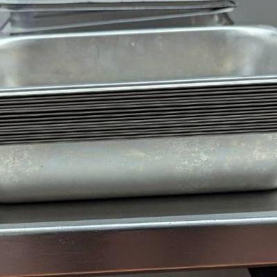 DBB496 - Sixteen Stainless Steel Commercial Pans.