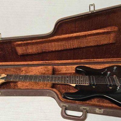 #2390 • Dean 7 String Guitar and Case
