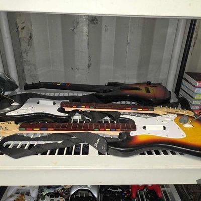 #4542 • (3) Guitar Controllers
