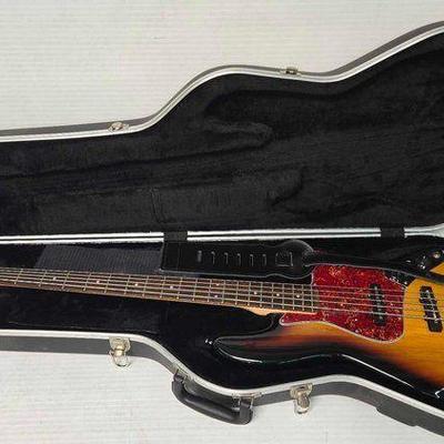 Sale Photo Thumbnail #311: #2366 • Squier by Fender 5 String Jazz Bass with Case
