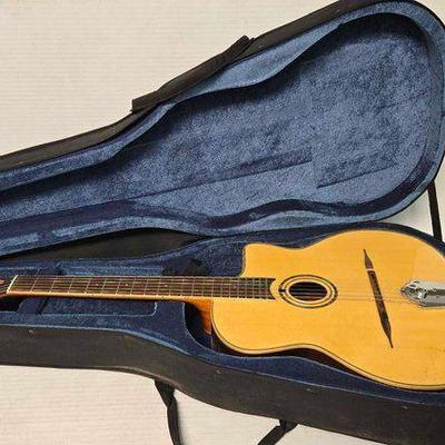 Sale Photo Thumbnail #340: #2424 • Aiersi Acoustic Guitar with Case
