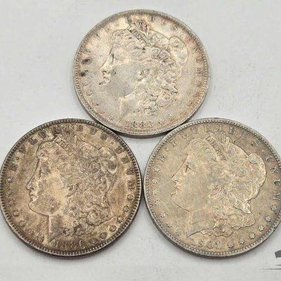 #1352 • (3) Morgan Silver Dollars
