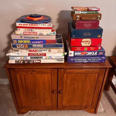 Lot 236: Vintage Board Games With Storage Cabinet