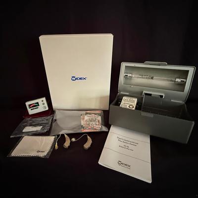 Lot 407: Widex Hearing Aids And Cleaner